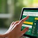 User interacting with a customer billing and top-up platform on their tablet